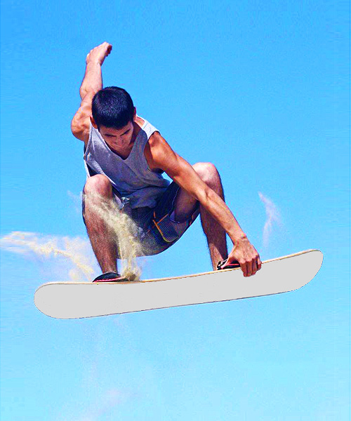 Young man in the sky on a sandboard.
